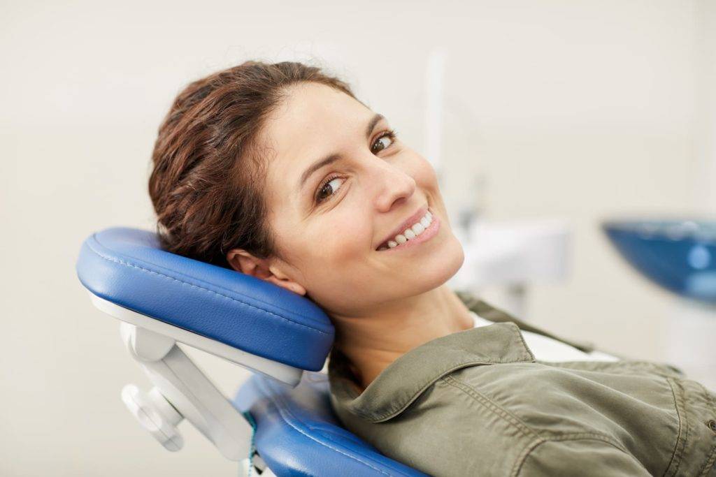 Woman In Dentist Chair