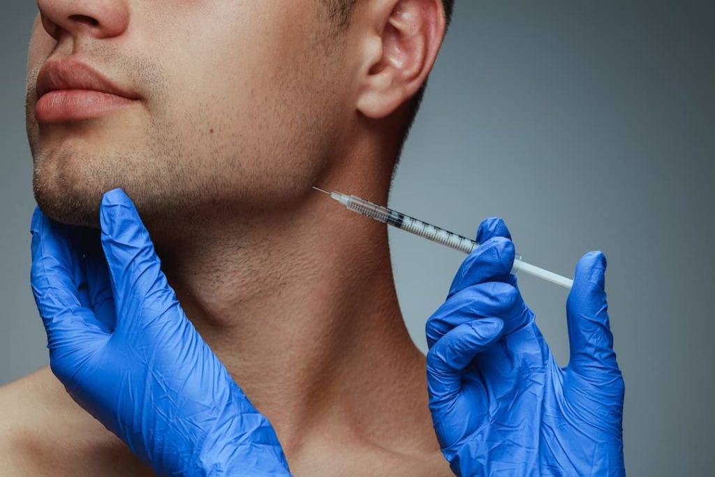 Man Recieving Facial Aeesthetic Treatment
